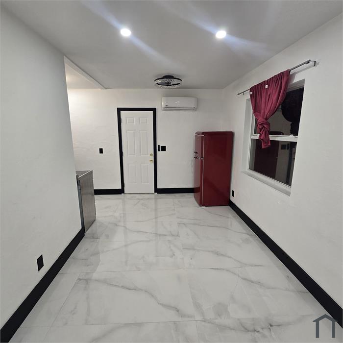 77 NW 51st St