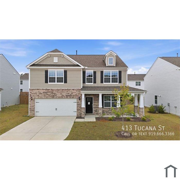 Spacious 4BR/2 5BA Home in Wendell with Modern Finishes and Open Layout and 2-Car Garage